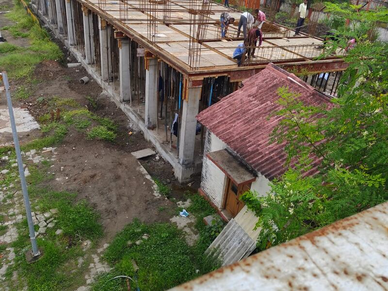 Shuttering propped and reinforcement being tied for the roof slab
